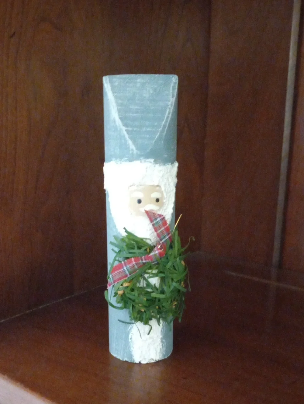 Handcrafted Powder Blue Wood Santa Holiday Figurine with Green Wreath